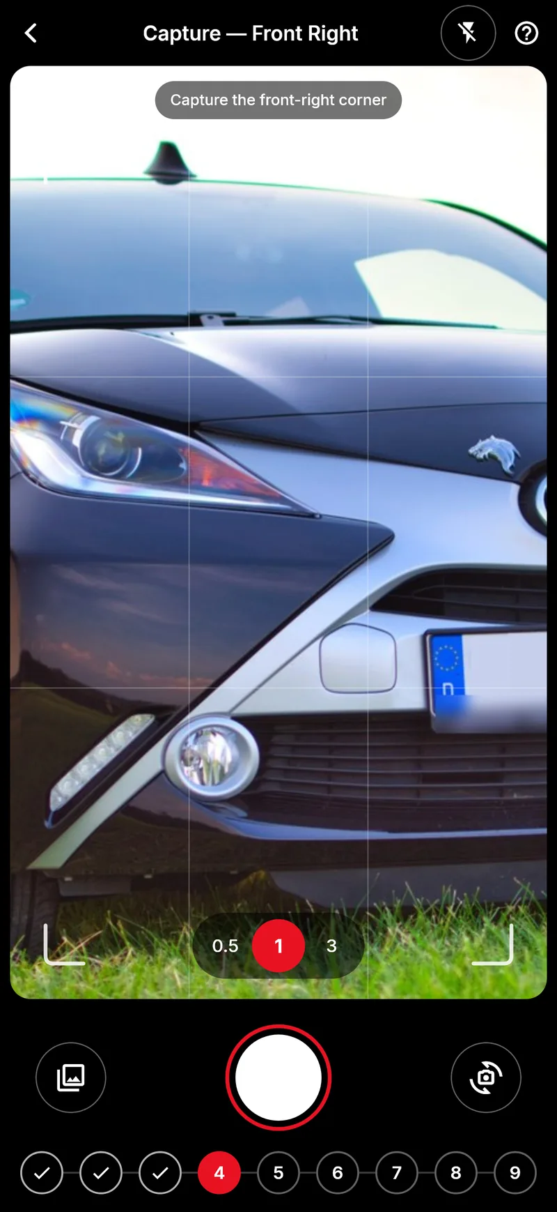 The guided camera photographing a corner of a car